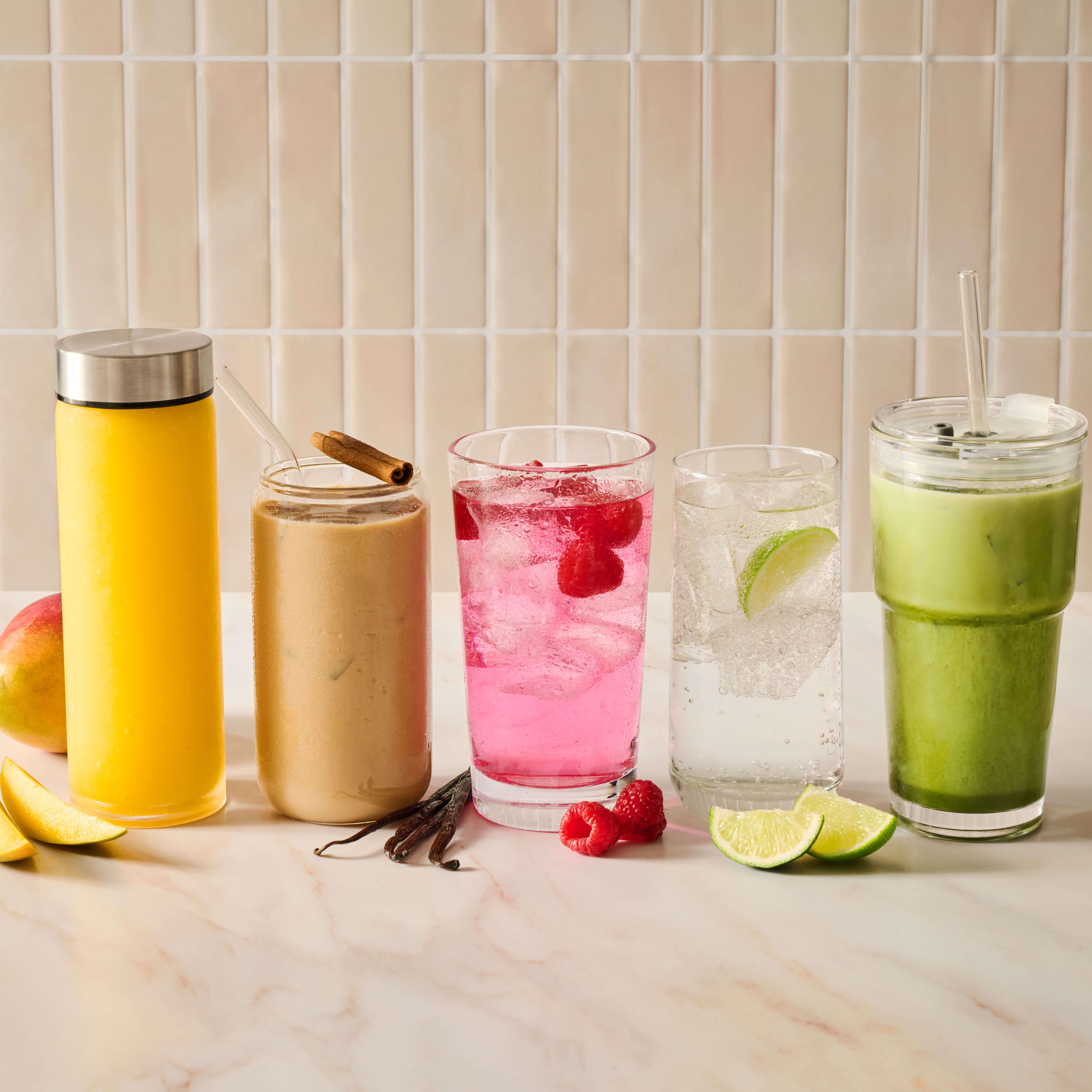 A selection of juices and beverages lined up.